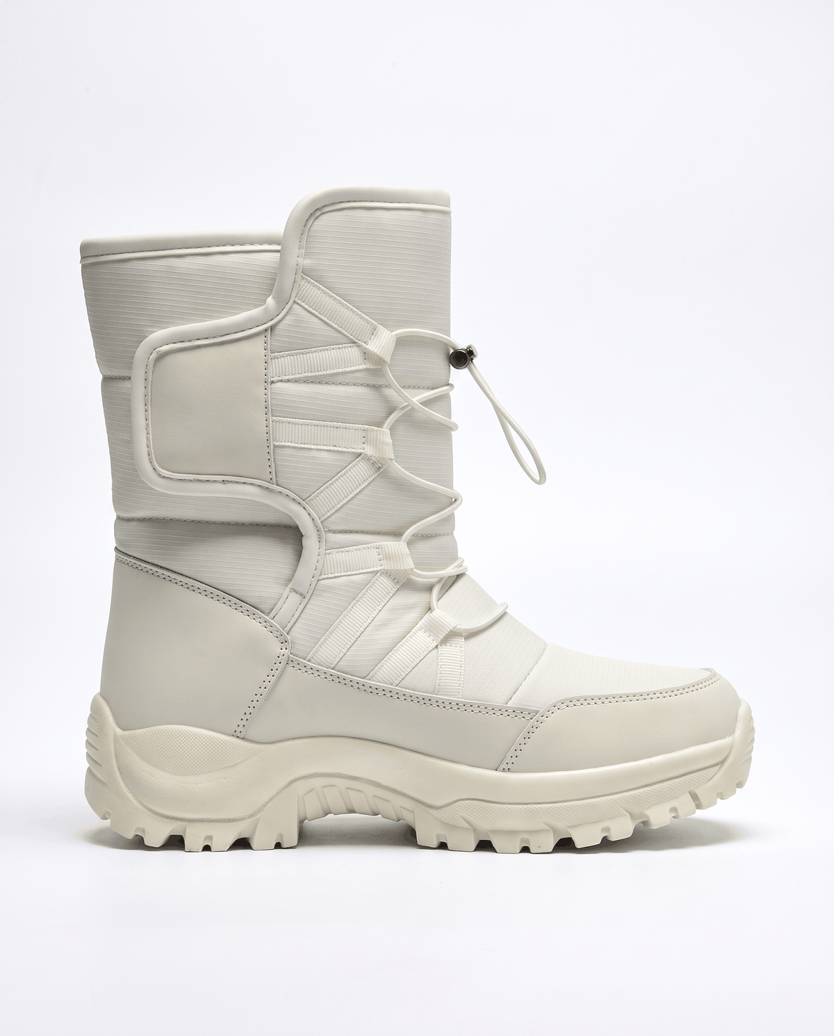 Side profile of a beige quilted boot with drawstring top and chunky lug sole