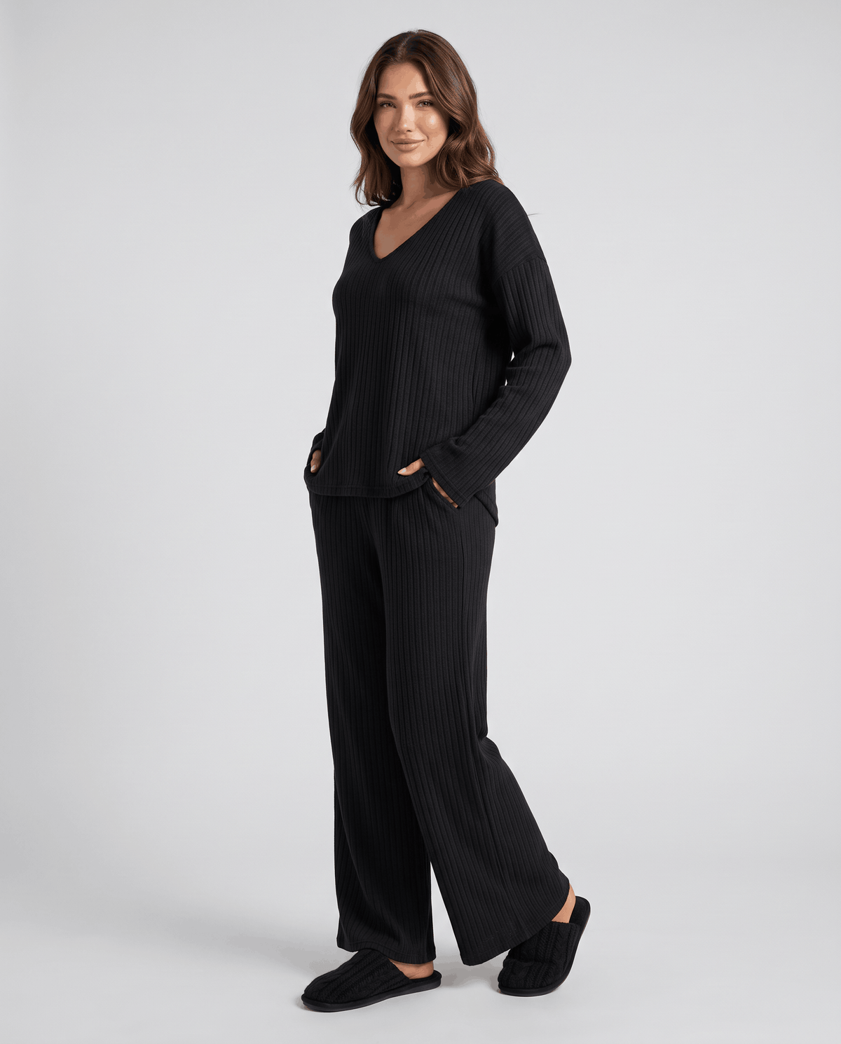 Black ribbed knit V-neck top and wide-leg pants, front view