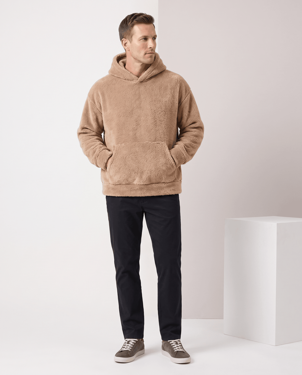 Full-length look with the brown hoodie, black trousers and gray sneakers