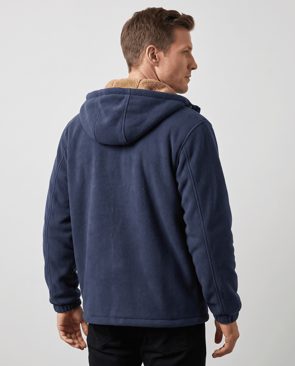 Back view of the navy fleece hoodie showing its relaxed fit
