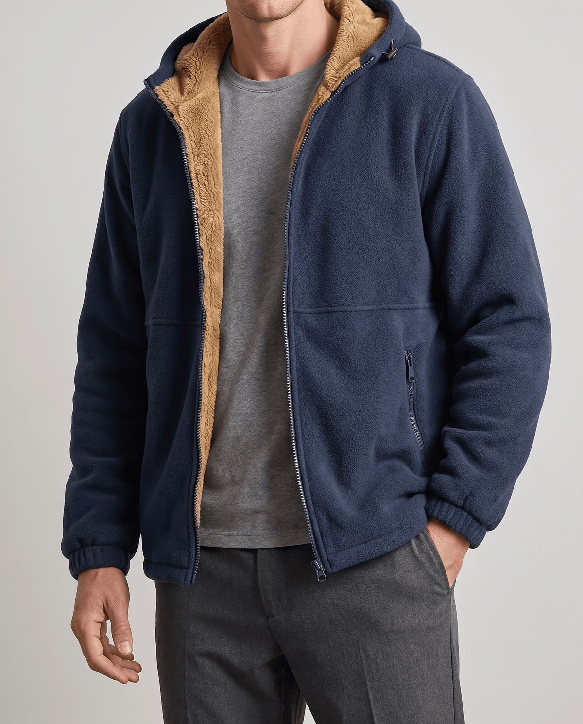 Navy sherpa-lined hoodie worn open over a gray tee with gray trousers