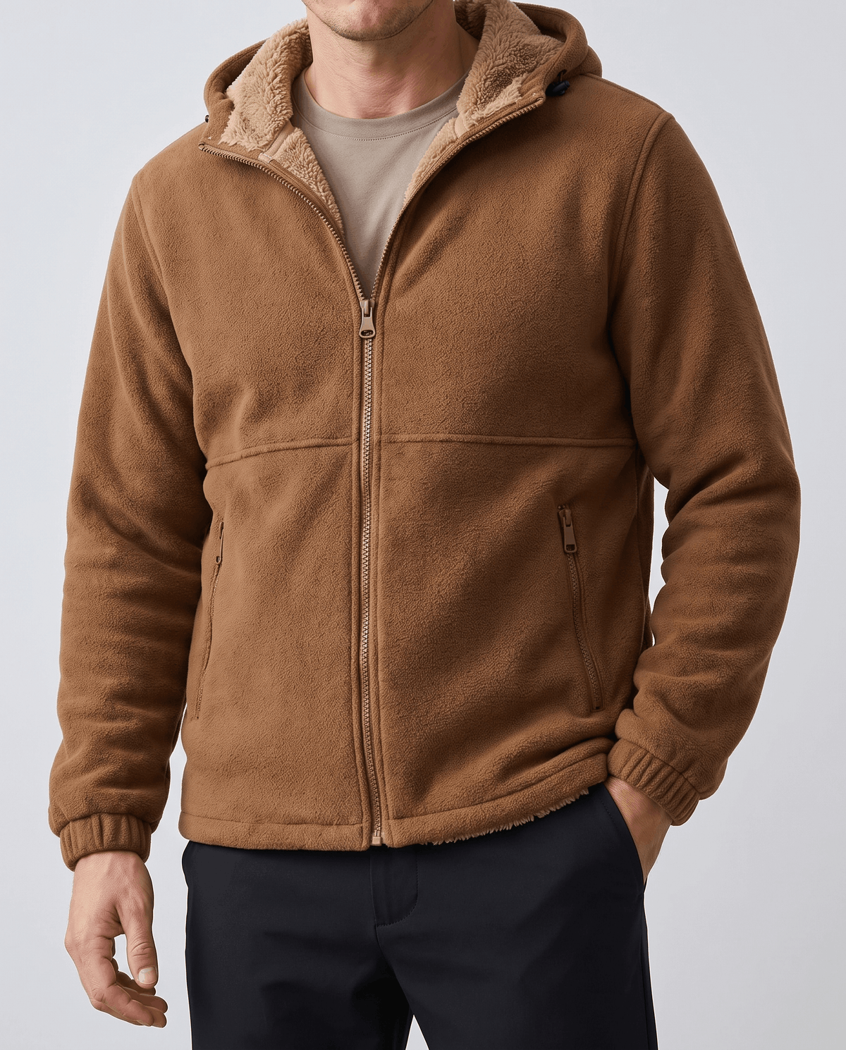 Front view of the khaki fleece hoodie zipped with slash pockets visible
