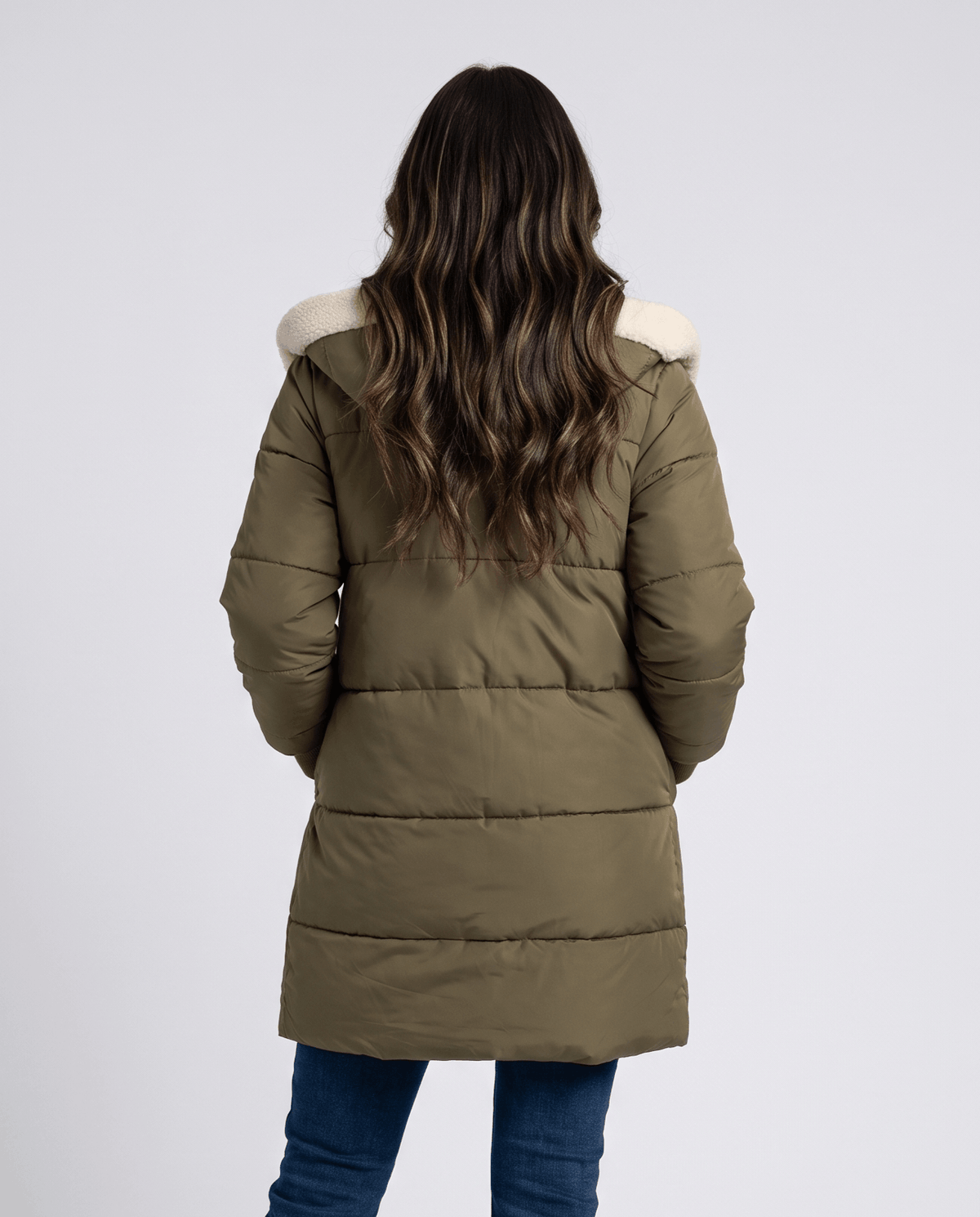 Back view of army green coat with quilted panels and hood