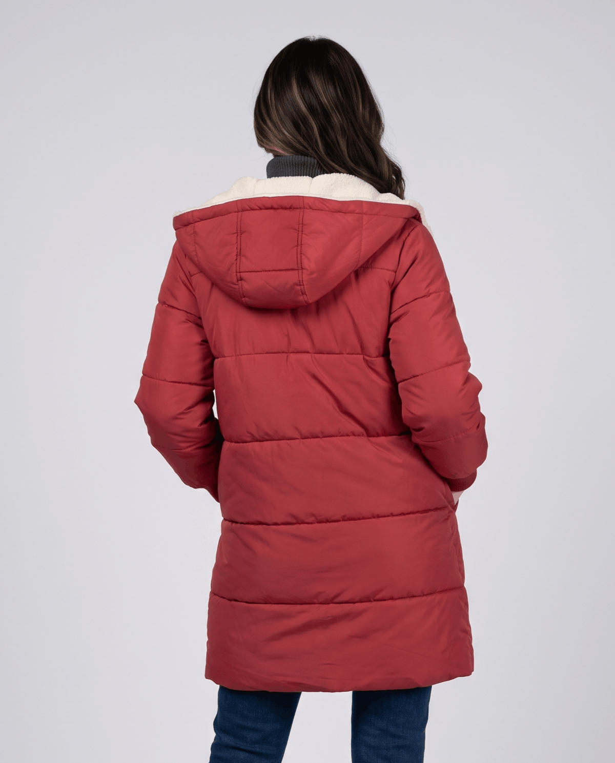 Back view of red puffer coat with sherpa-lined hood down