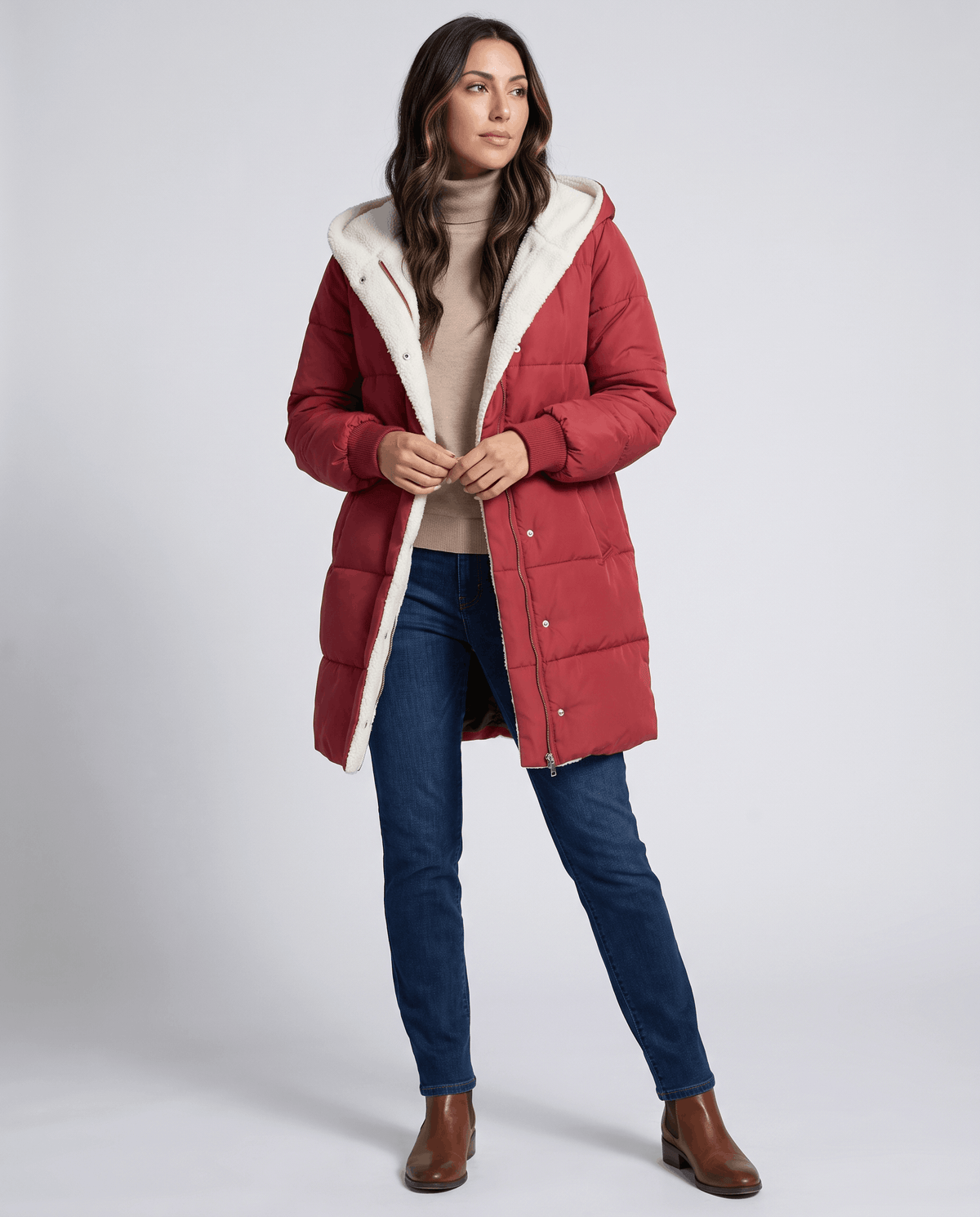 Full-length view of red coat with blue jeans and brown boots
