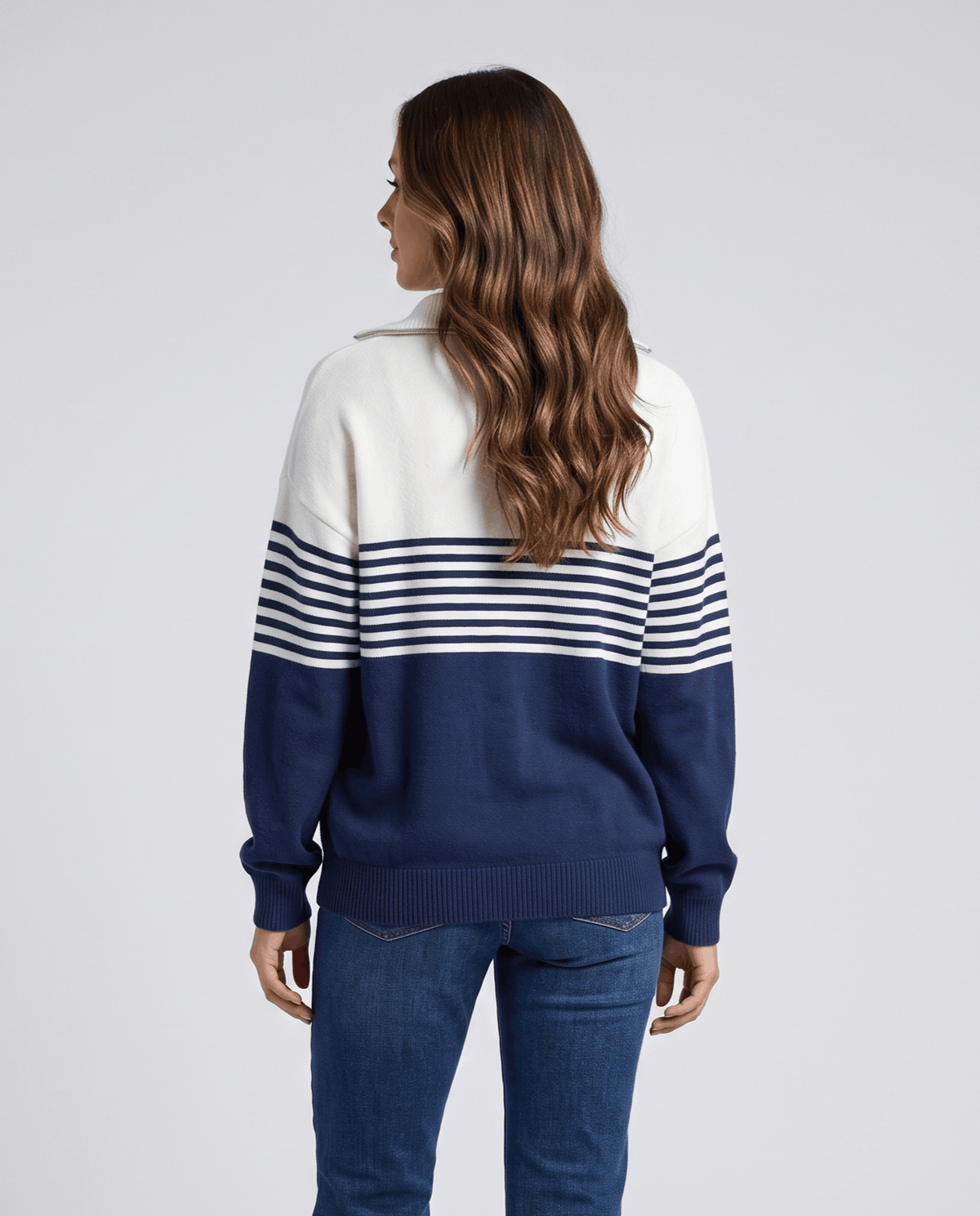 Back view of navy blue and ivory pullover with stripes across the shoulders