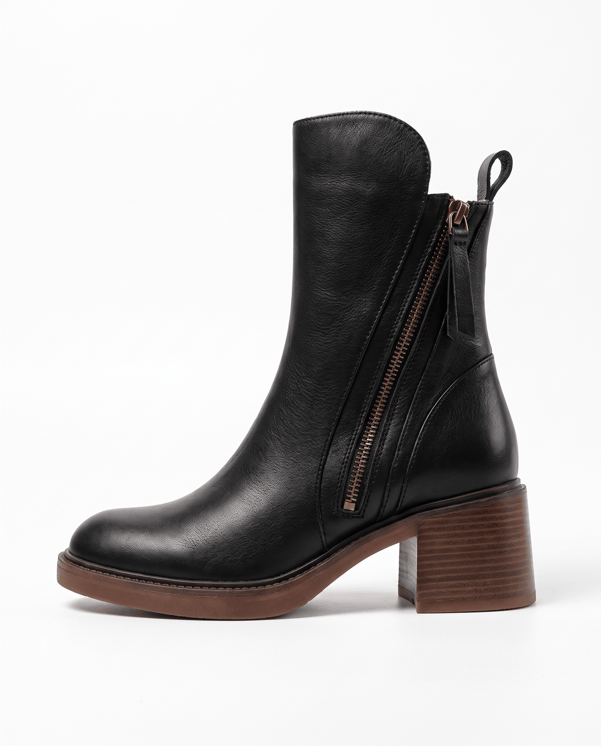 Side view of a black block heel ankle boot with smooth finish and tassel zip pull