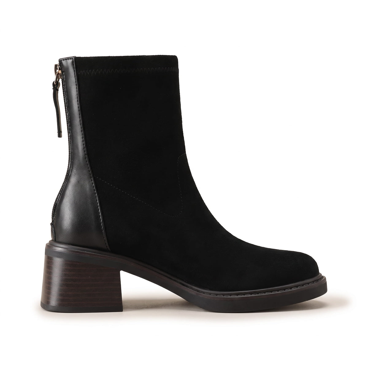 Side view of a black suede ankle boot with back zip and block heel