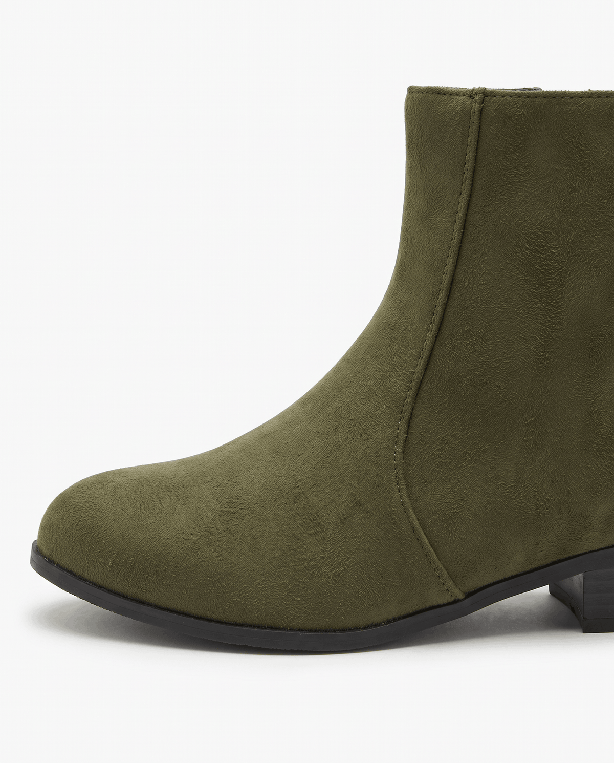 Close-up of the rounded toe on an olive green suede-look boot