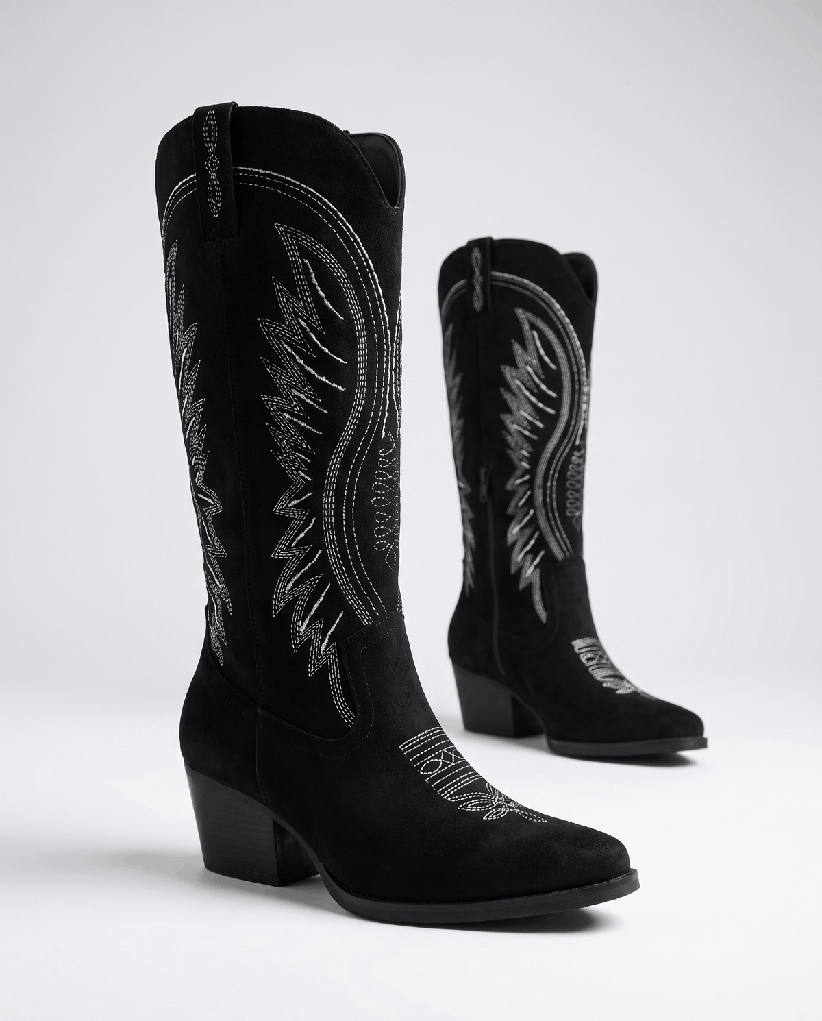 Black pair with white contrast stitching and a low block heel