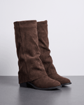 Pair of brown fold-over vegan suede boots with wide shafts and low block heels