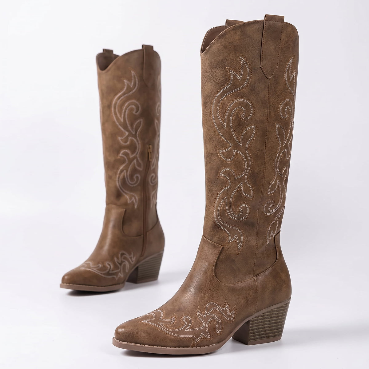 Brown pair angled to show the shaft stitching and block heel