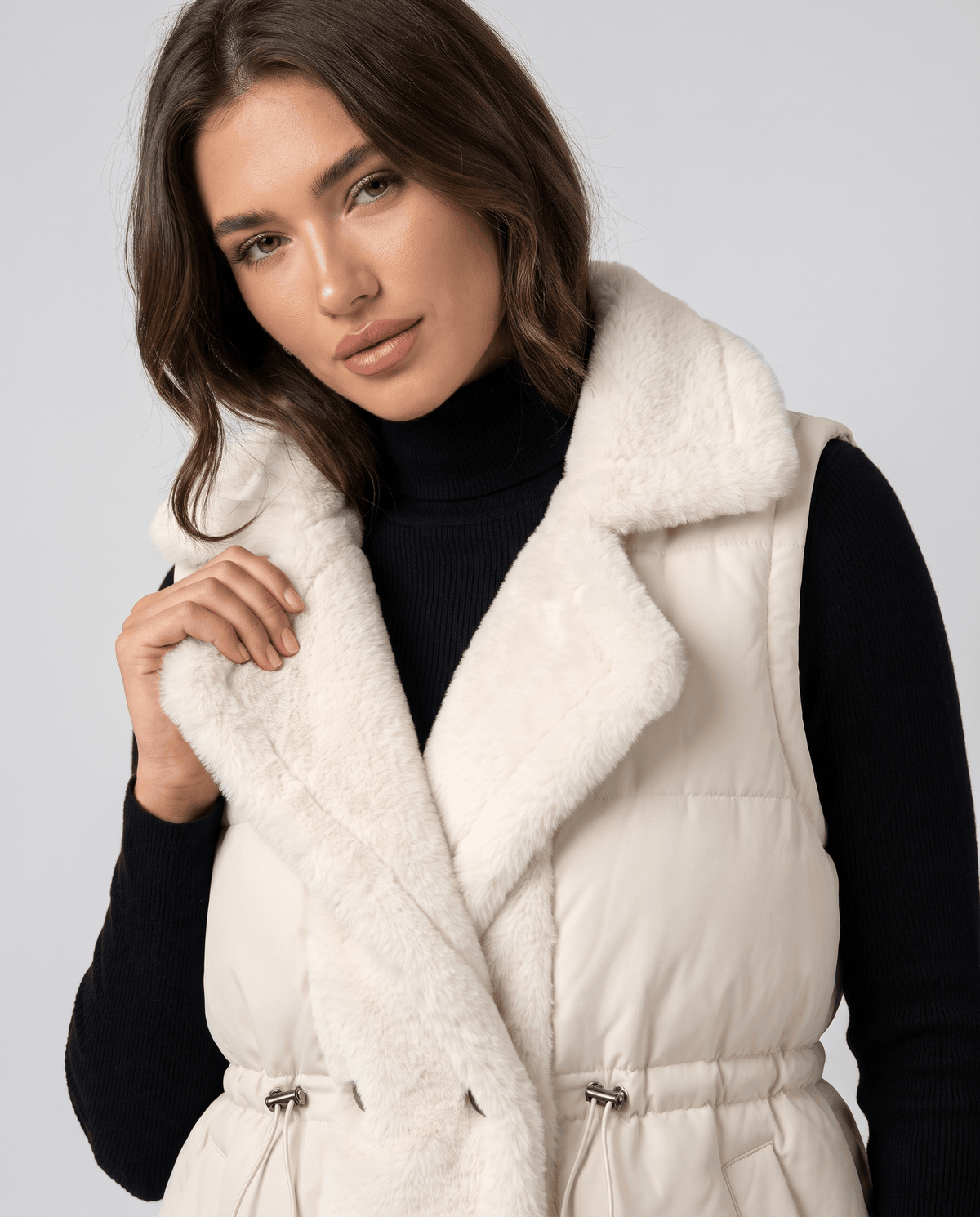 Ivory padded vest plush collar and button front shown in close view
