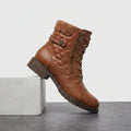 Brown quilted vegan leather lace-up ankle boot with a knit cuff and side zip.
