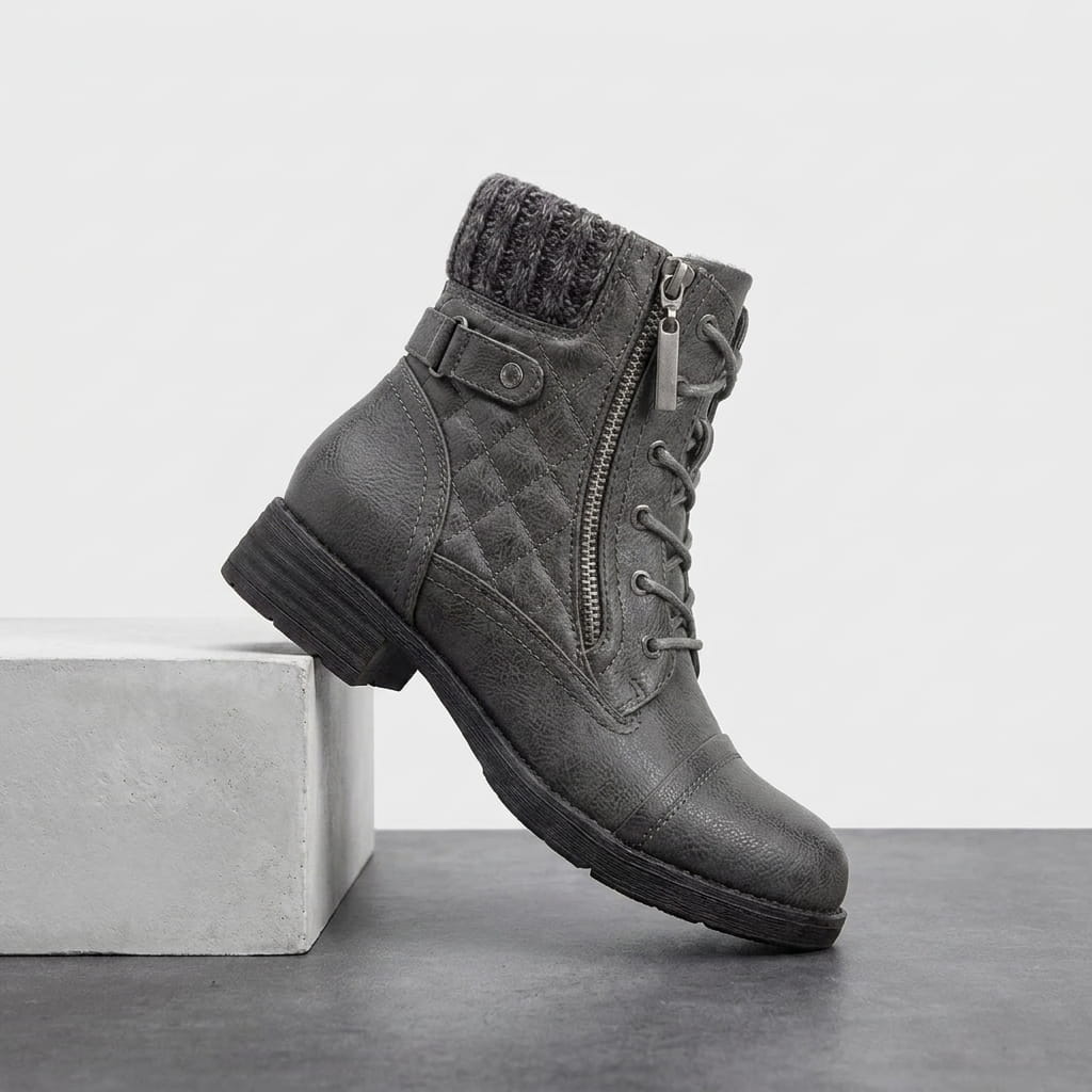 Gray quilted vegan leather lace-up ankle boot with a knit cuff and side zip.