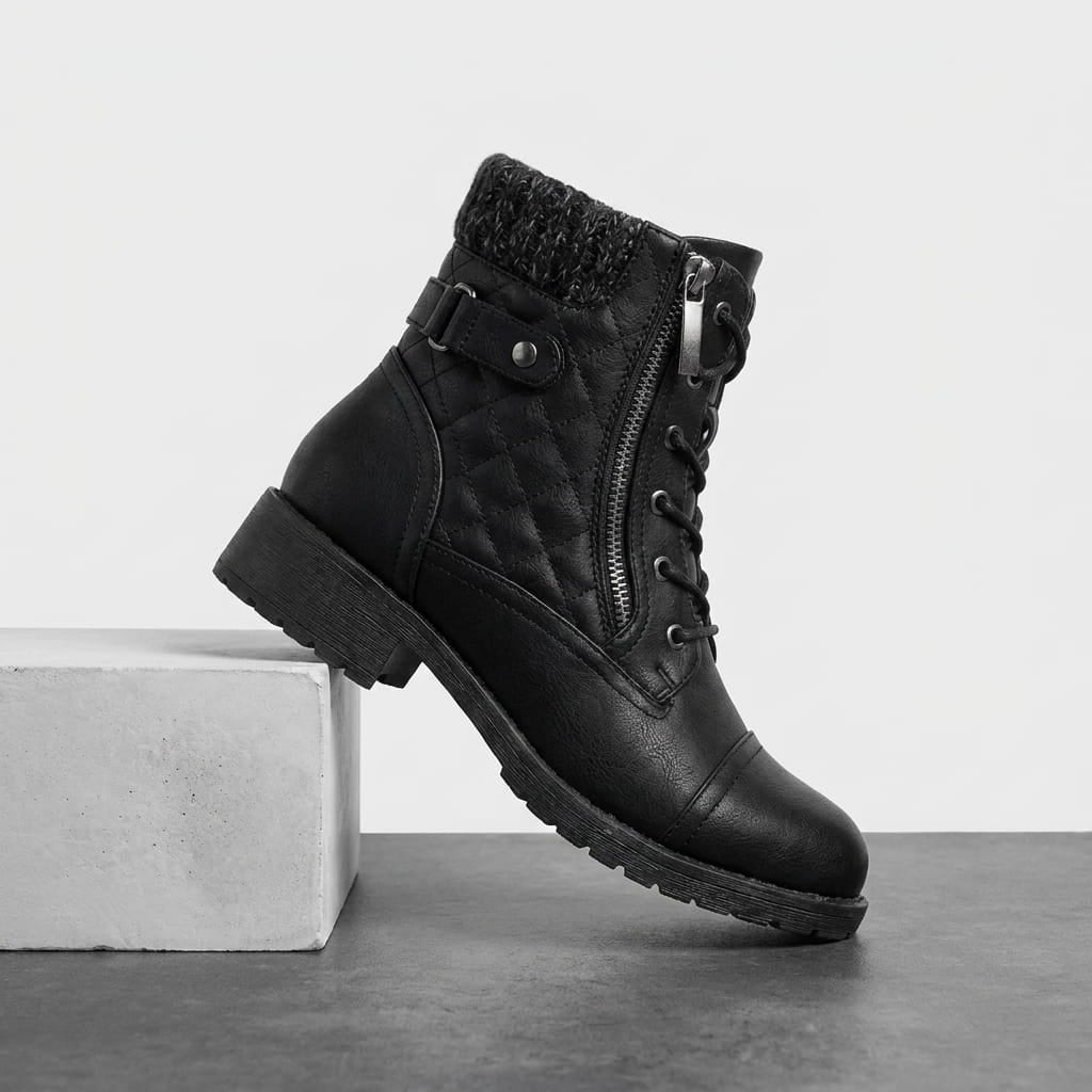 Black quilted vegan leather lace-up ankle boot with a block heel.