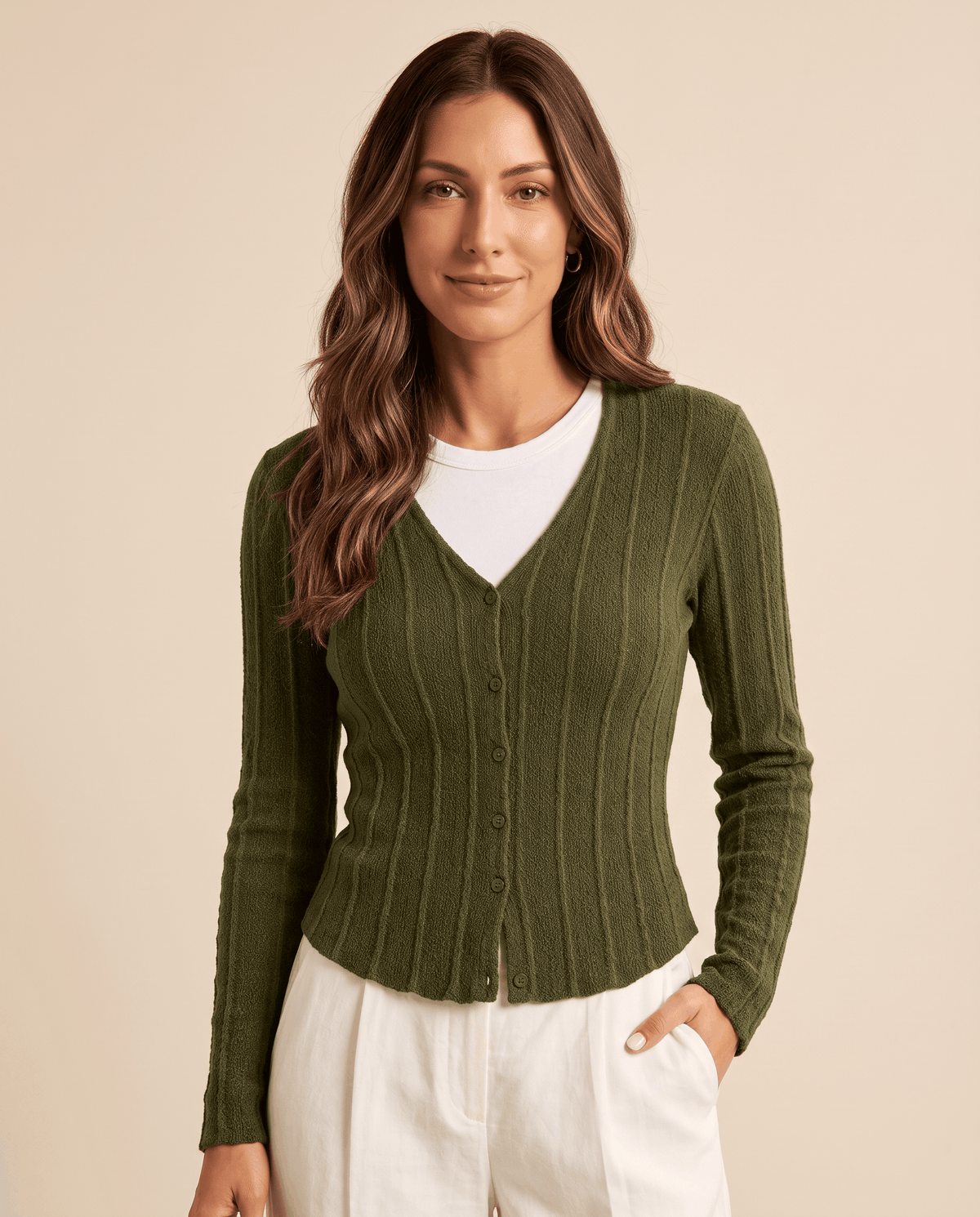 Green ribbed cardigan with button front shown in a close front view
