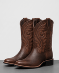 Pair of brown square-toe leather cowboy boots with tonal embroidery and stacked heels