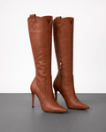 Brown smooth-grain knee-high boots with a pointed toe, slim stiletto heel, close-cut shaft, side zip, and collar pull tab.
