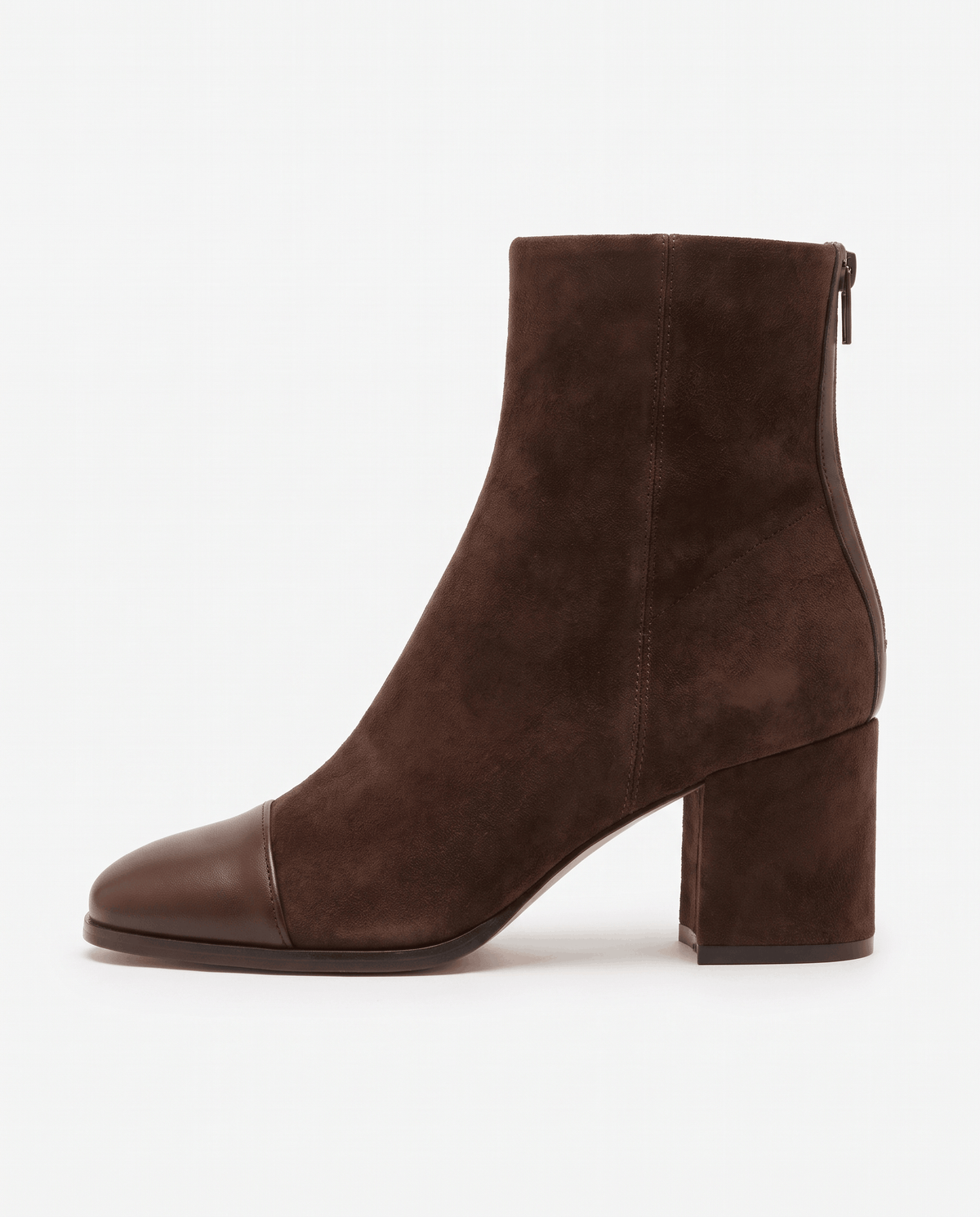 Side view of a brown suede ankle boot with a slim toe cap