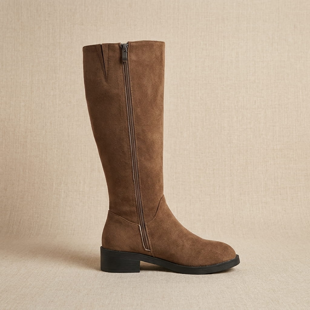 Single brown suede knee-high boot shown in side profile.