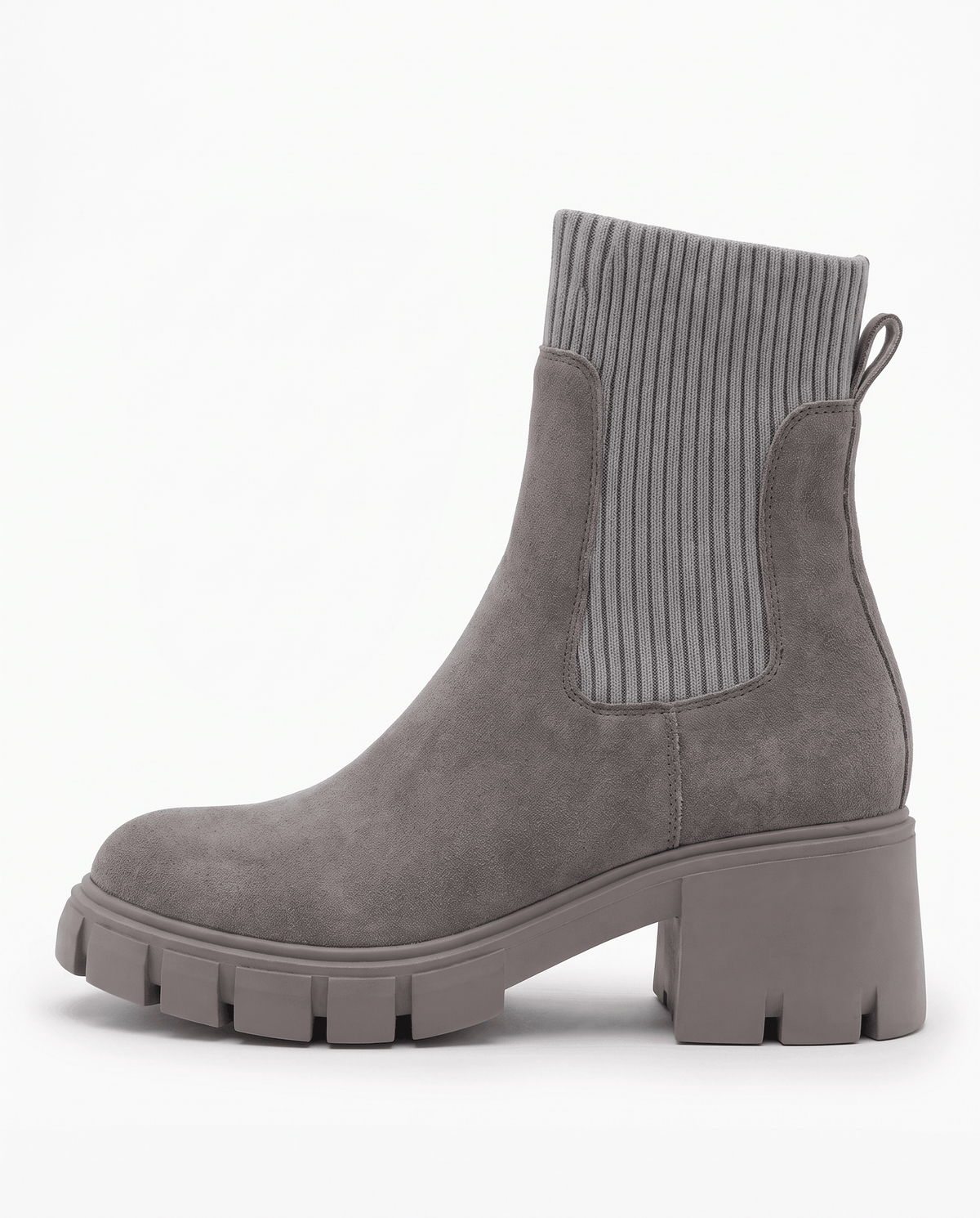Side view of gray suede boot with block heel and lugged sole