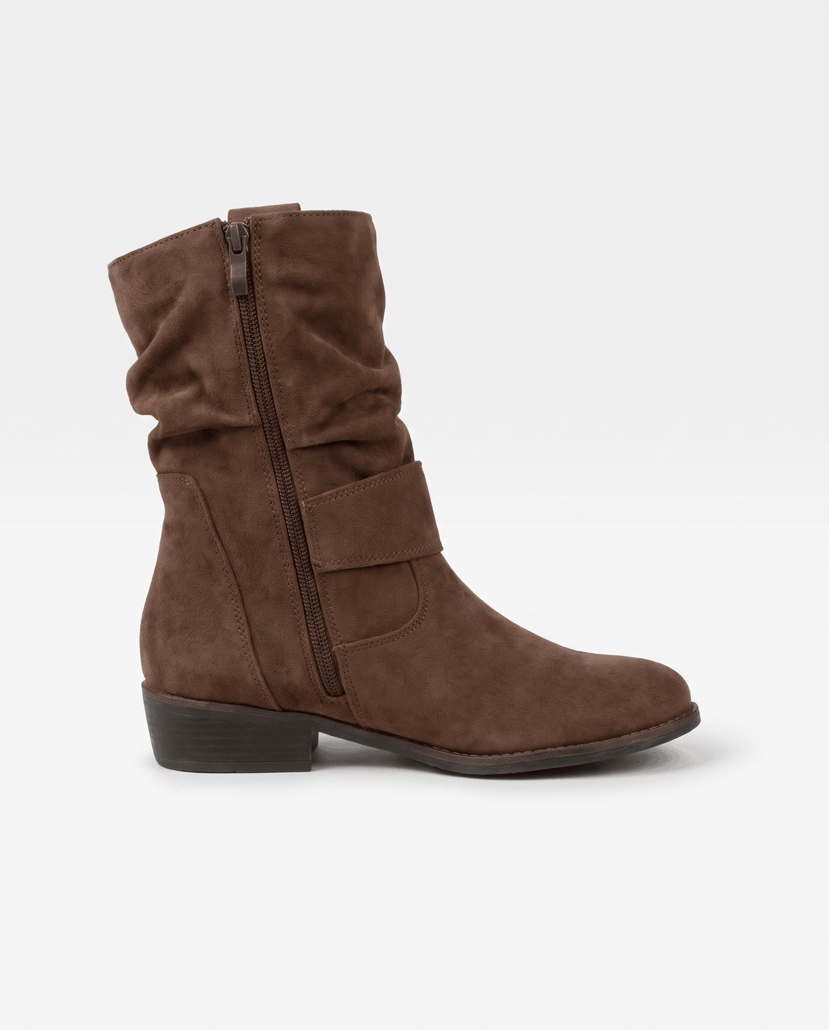 Side view of a brown suede boot with a slouchy shaft and zip