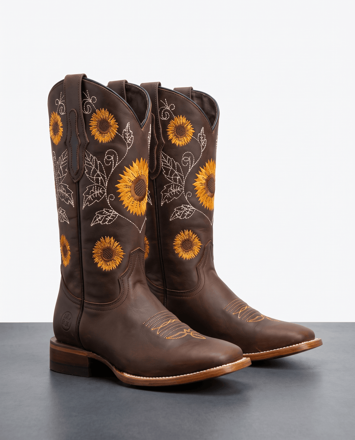 Dark brown pair with large yellow sunflowers and a broad square toe