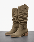 Taupe vegan suede knee-high boots with a slouchy ruched shaft, full side zip, ankle strap, and low stacked heel.
