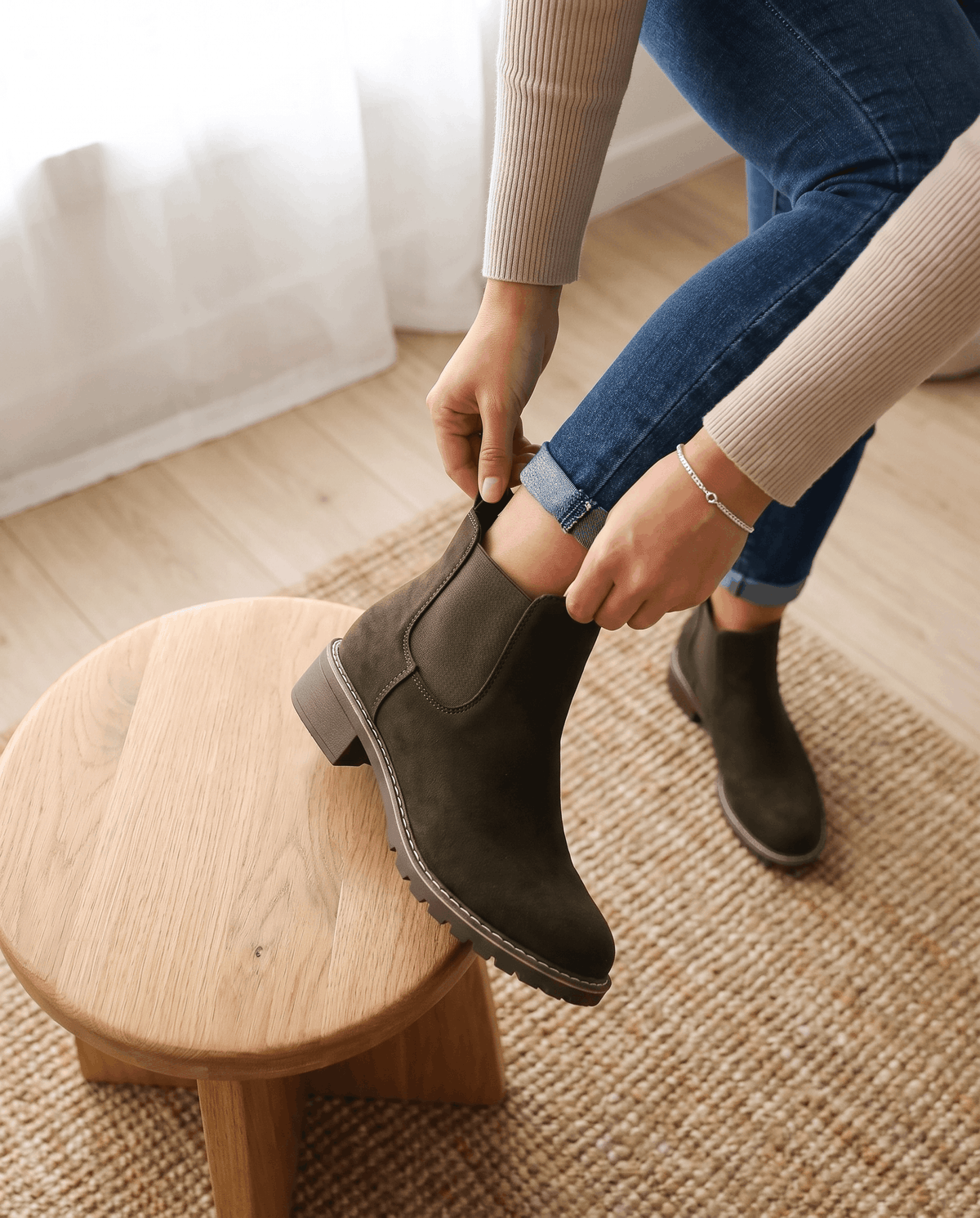 Dark brown vegan suede Chelsea boots with elastic side panels, a stacked block heel, and a durable lug outsole.