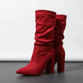 Red vegan suede slouchy mid-calf boots with pointed toes and tall block heels.