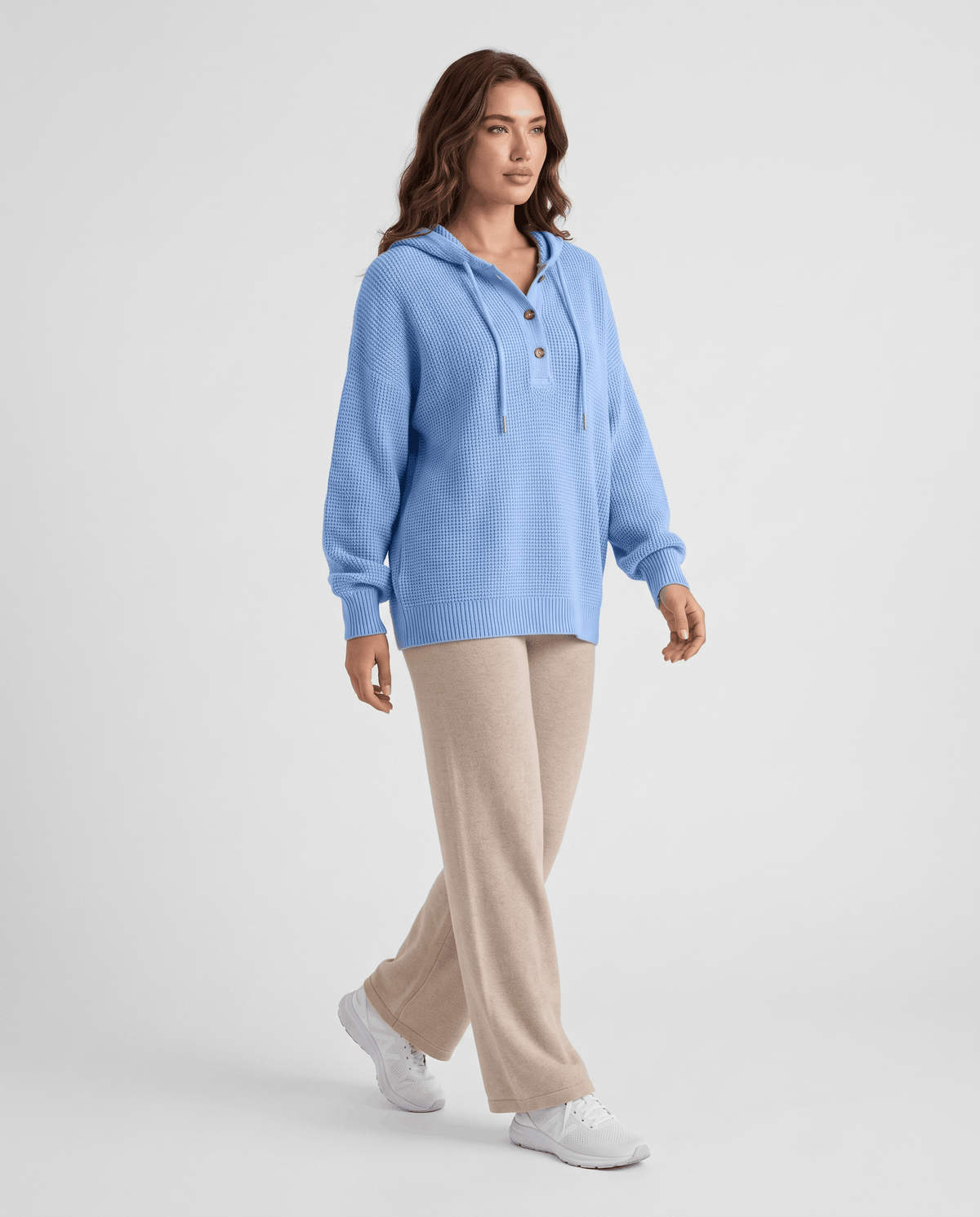 Full-length look pairing the light blue waffle knit hoodie with beige wide-leg pants