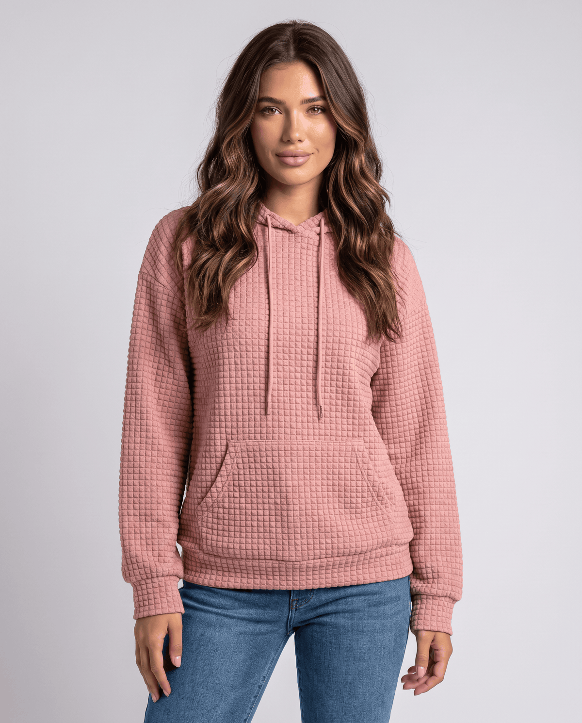 Women's waffle knit pullover hoodie in dusty pink with kangaroo pocket and drawstring hood