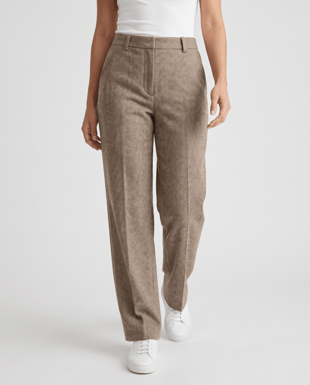 Wool-blend straight-leg trousers in camel herringbone, front view with white sneakers