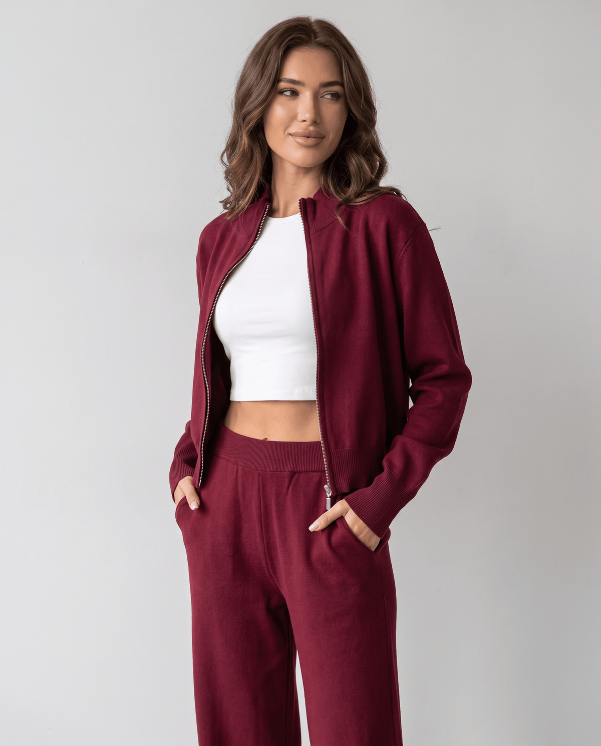 Burgundy zip-up cardigan and wide-leg pants lounge set, front view with hands in pockets